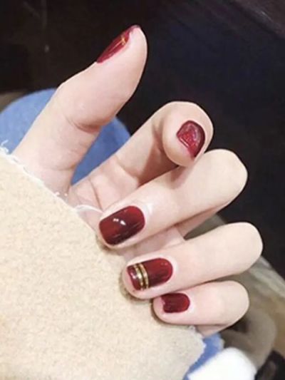 Uñas Artificiales Reusables Vinotinto y Dorado R019