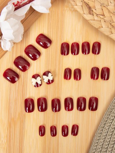 Uñas Reusables Artificiales Decorado Vinotinto con Moño XZ004